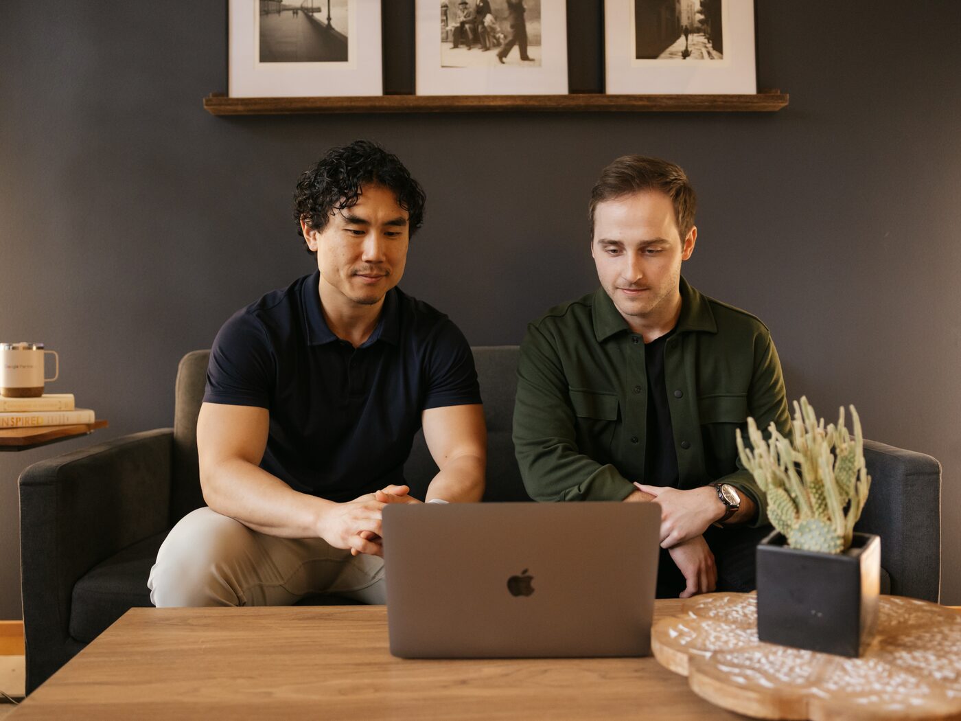 David Chung collaborating with a teammate over a laptop