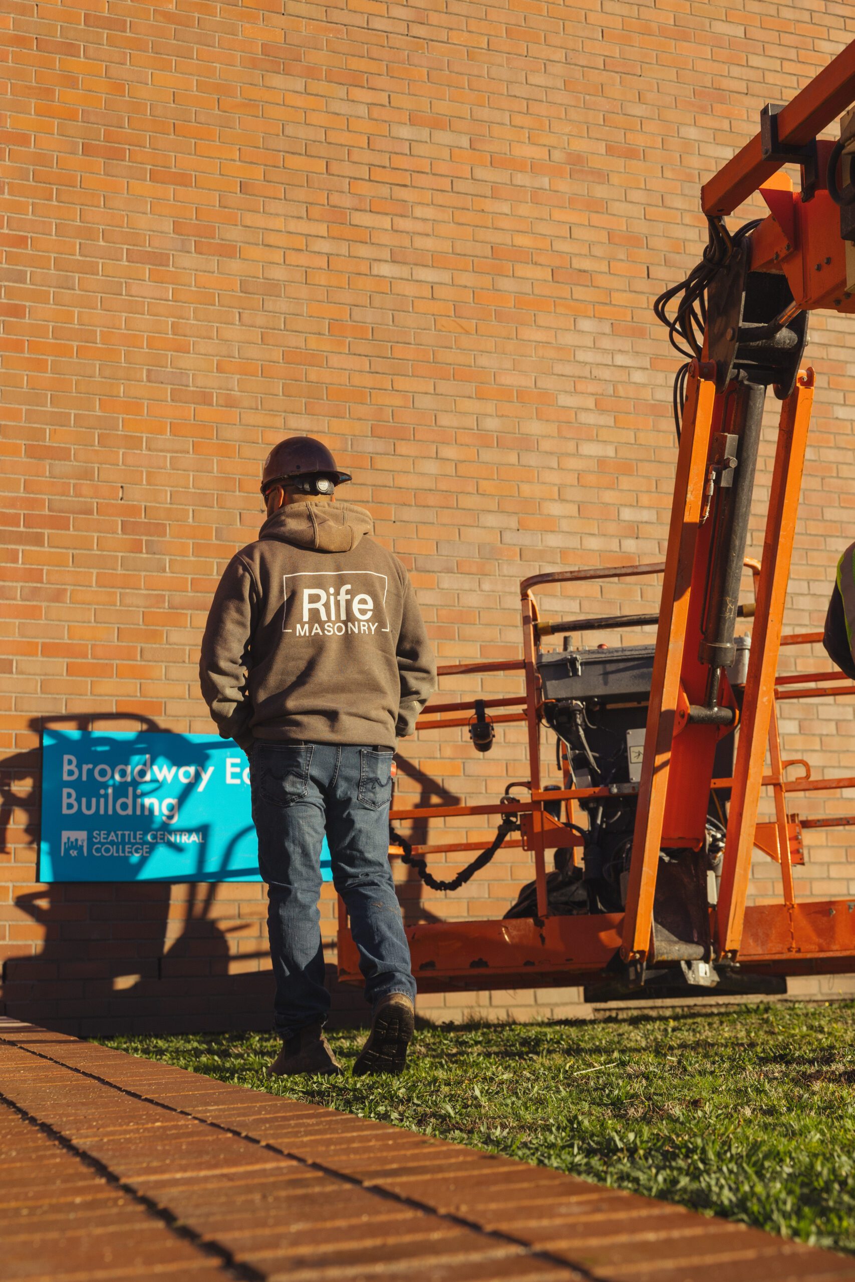 Rife Masonry crew member on a commercial job site at Seattle Central College