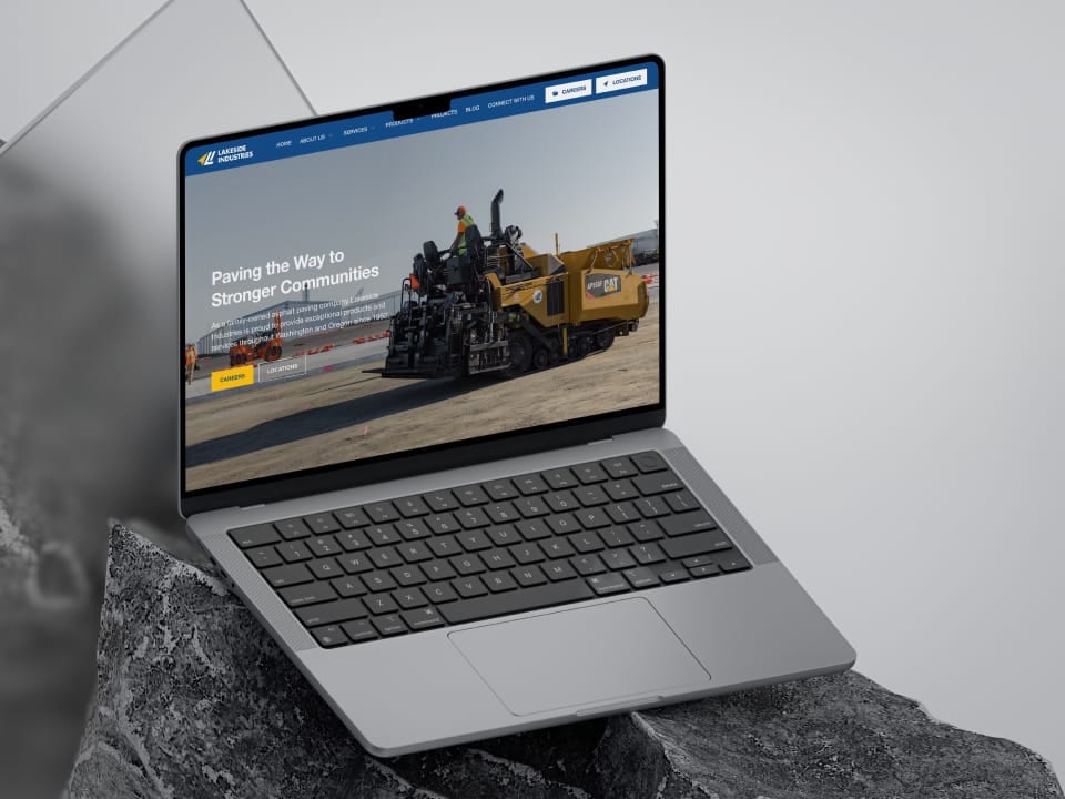 Laptop showing Lakeside Industries Paving the Way homepage