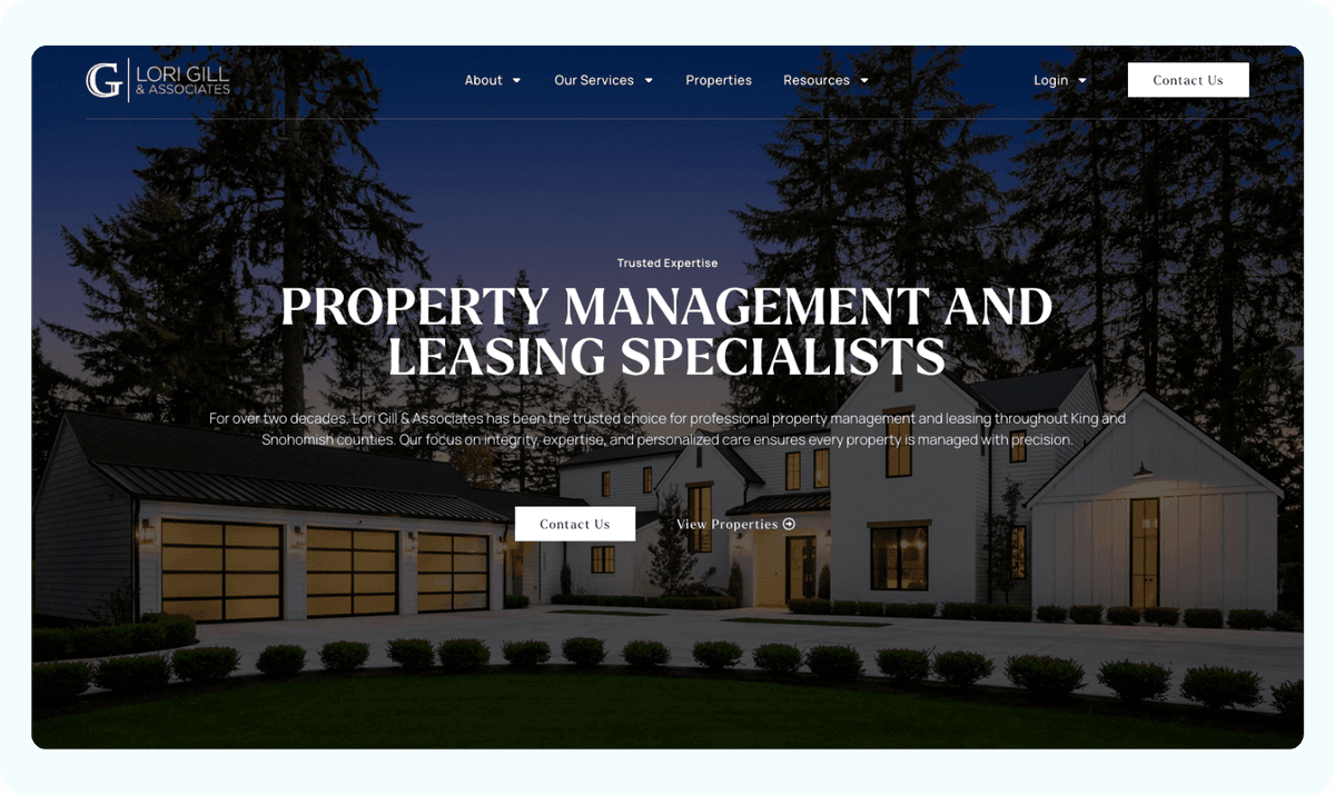 Lori Gill & Associates website homepage featuring modern house at dusk with Property Management and Leasing Specialists headline